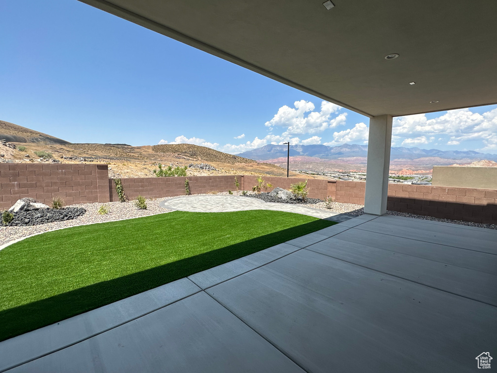 View of patio with a mountain view