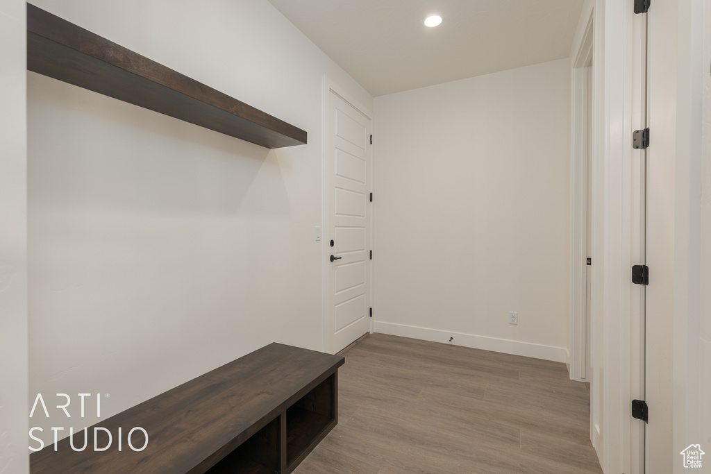 Mudroom featuring dark wood-type flooring