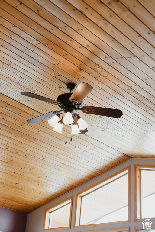 Interior details featuring wood ceiling and ceiling fan