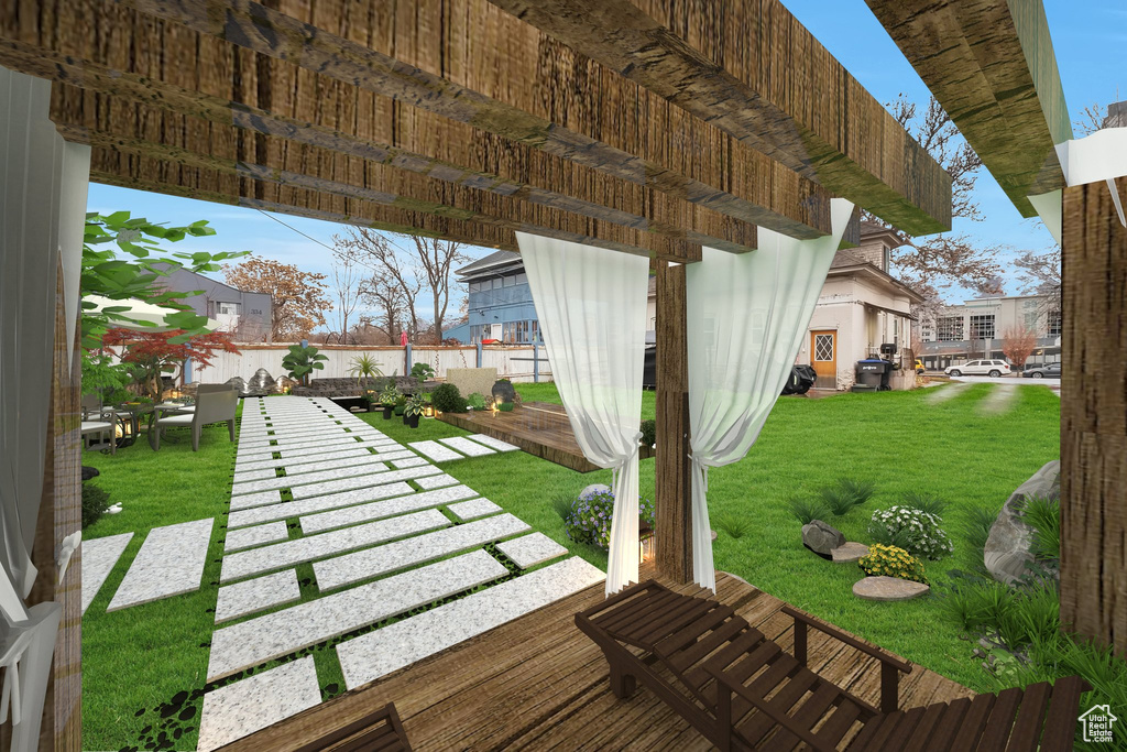 Deck featuring a lawn
