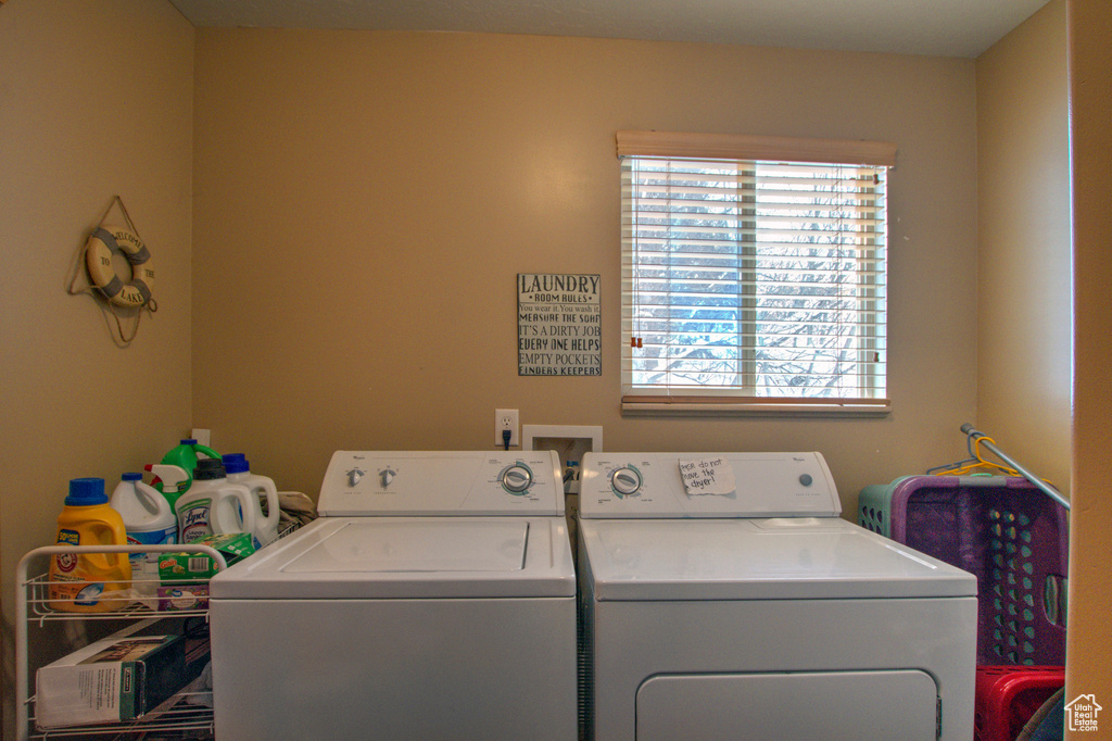 Laundry room with plenty of natural light, washer and dryer, and washer hookup