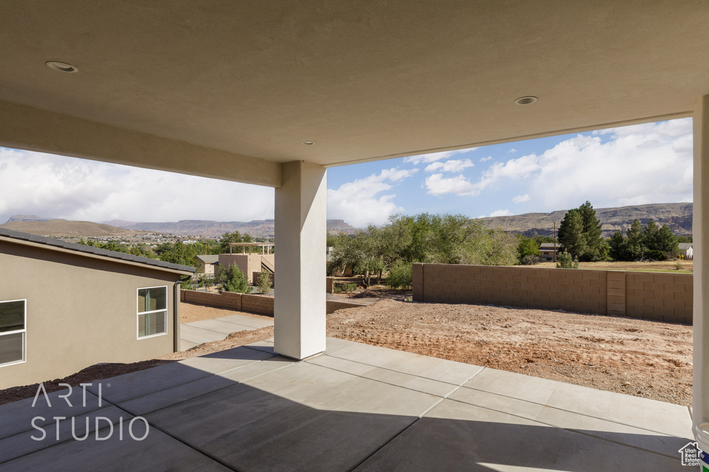 View of patio / terrace featuring a mountain view