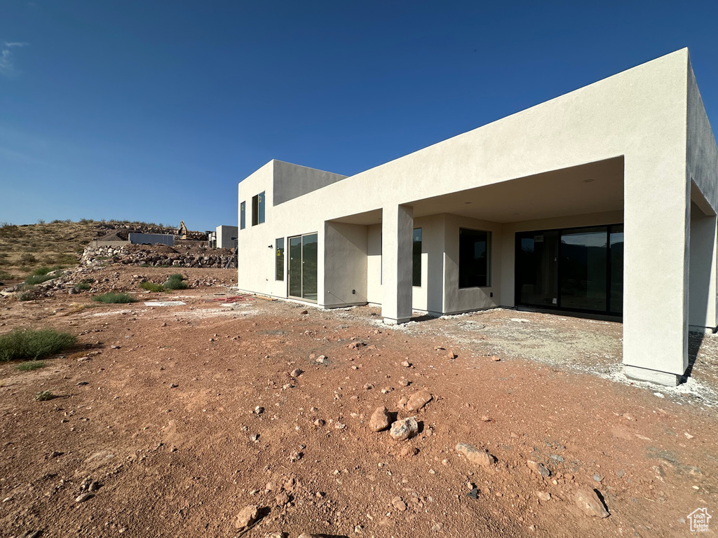 Back of property with a patio area