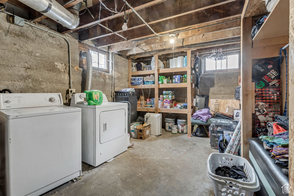 Basement featuring washer and clothes dryer