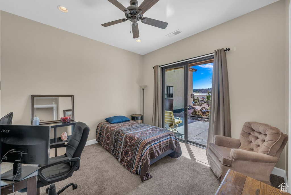 Bedroom with ceiling fan, access to outside, and light carpet