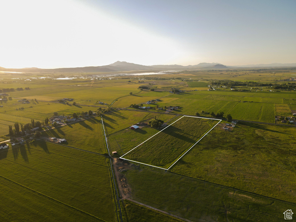 Birds eye view of property featuring a mountain view and a rural view