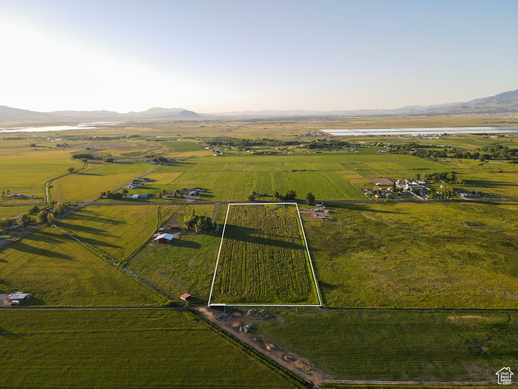 Birds eye view of property featuring a mountain view and a rural view