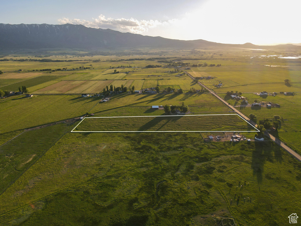 Birds eye view of property featuring a mountain view and a rural view