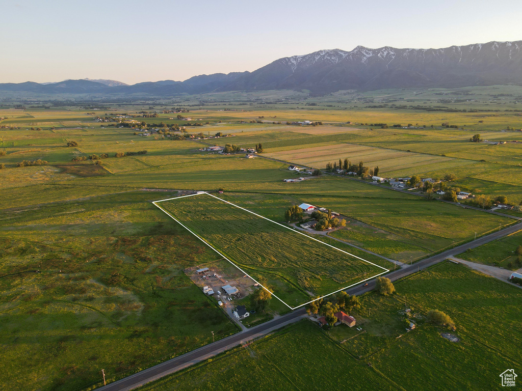 Aerial view at dusk with a rural view and a mountain view