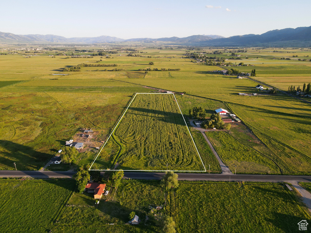 Birds eye view of property featuring a mountain view and a rural view