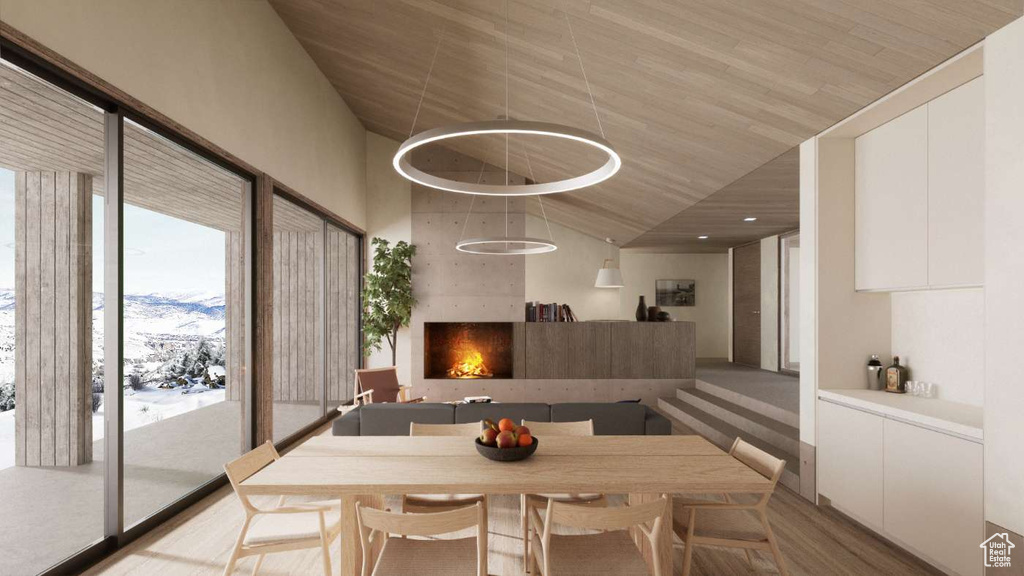 Dining space featuring wood ceiling
