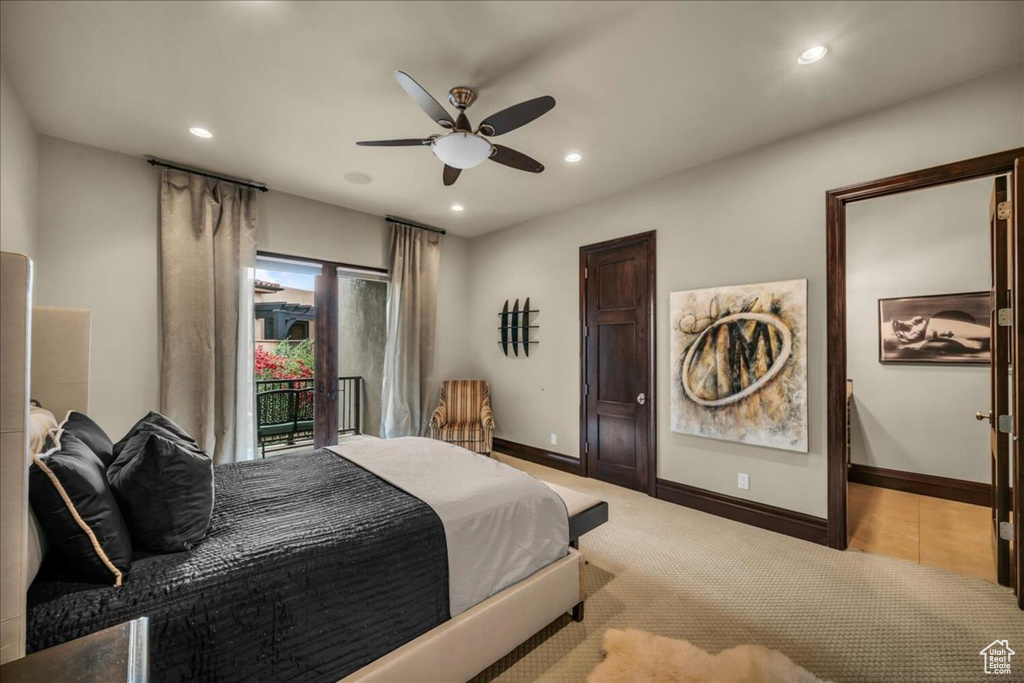 Bedroom featuring access to outside, ceiling fan, and light colored carpet