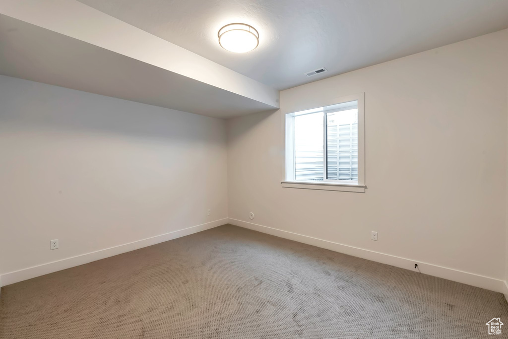 View of carpeted spare room