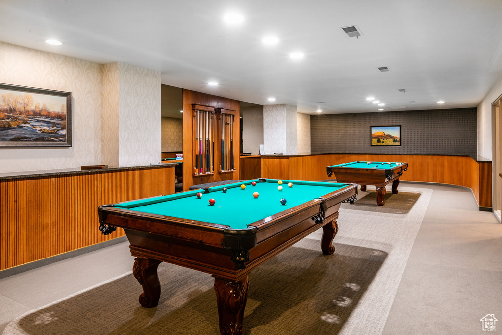 Rec room with pool table and light carpet