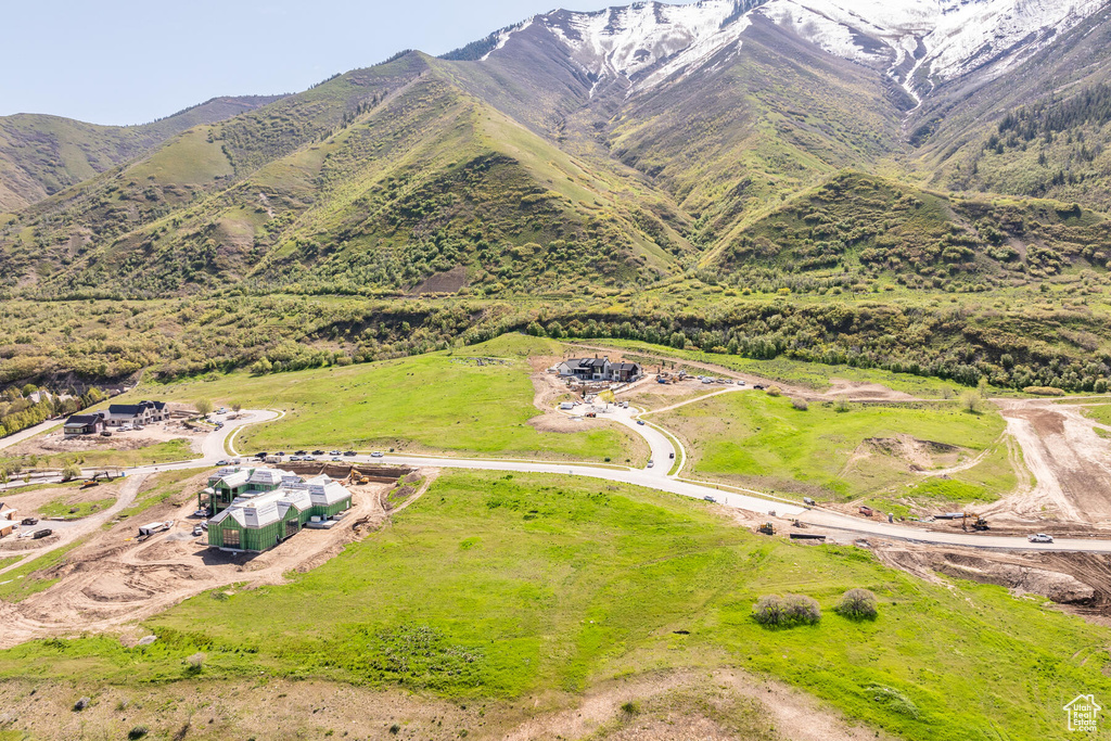 Birds eye view of property featuring a mountain view