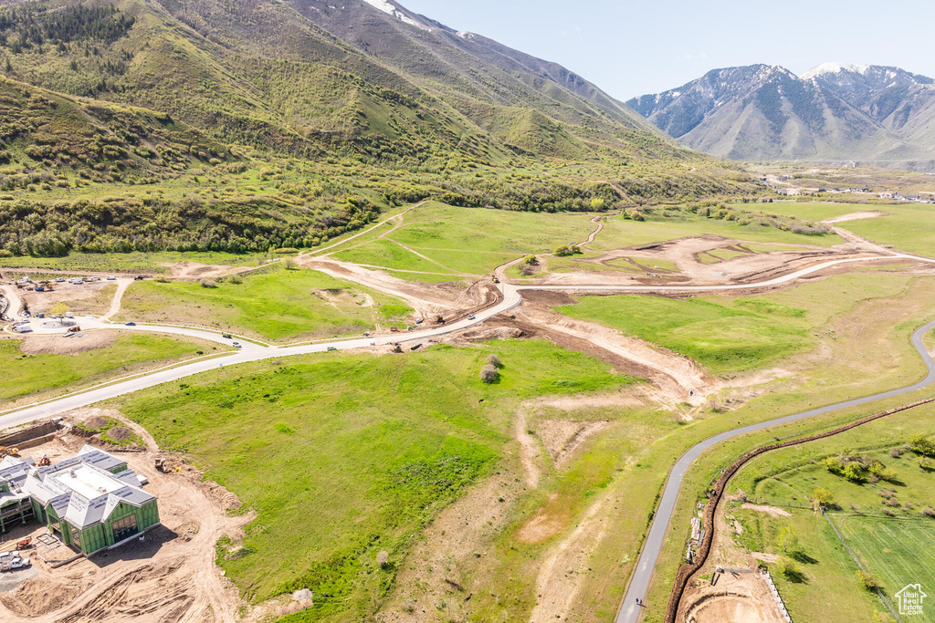 Aerial view featuring a rural view and a mountain view