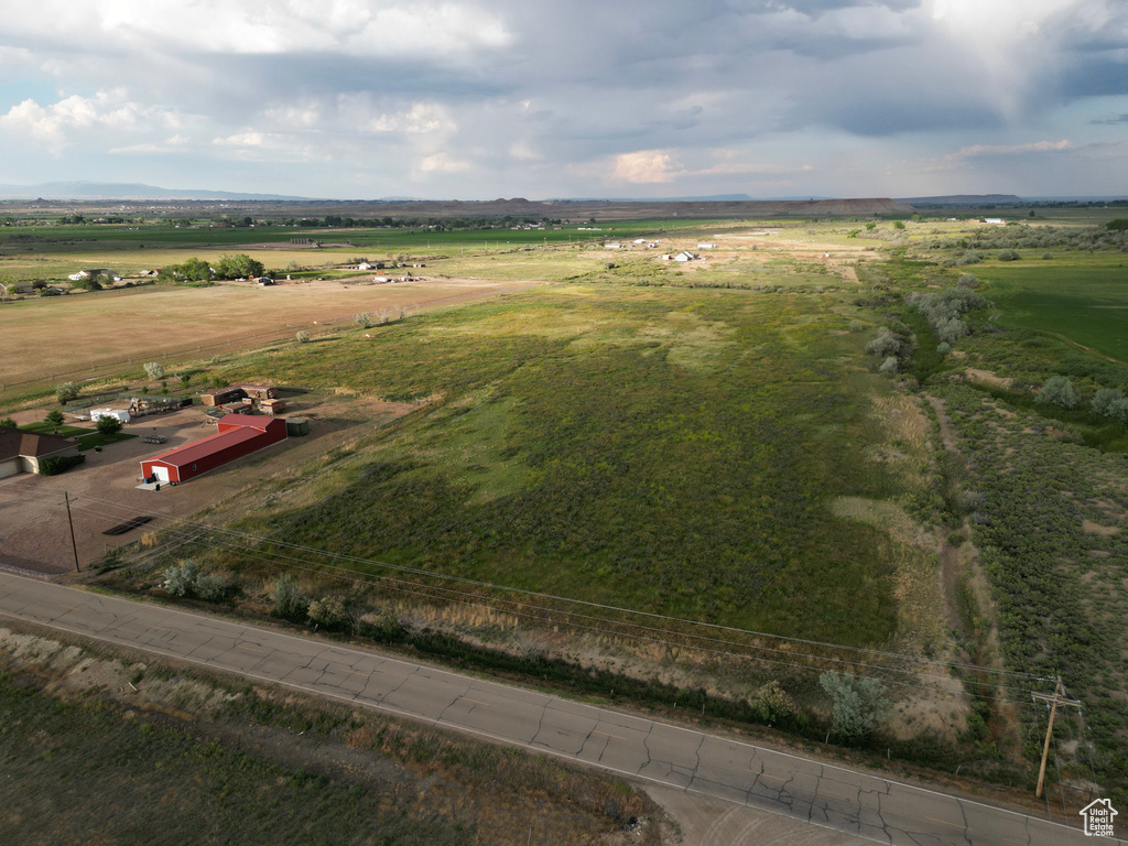 Birds eye view of property with a rural view