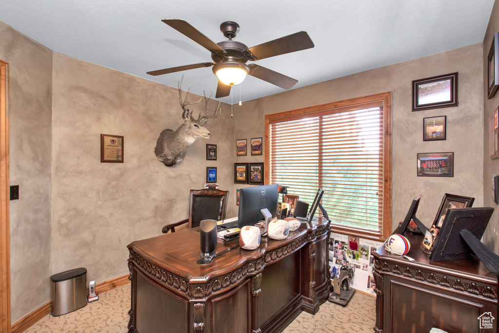 Office space featuring ceiling fan