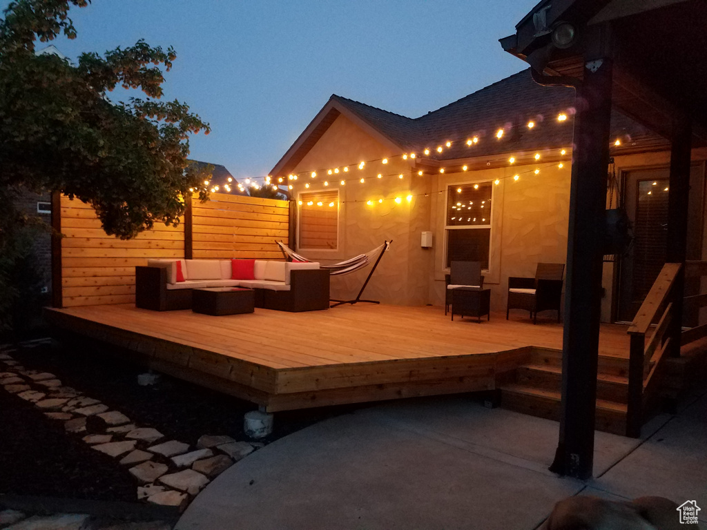 View of terrace with an outdoor living space and a wooden deck
