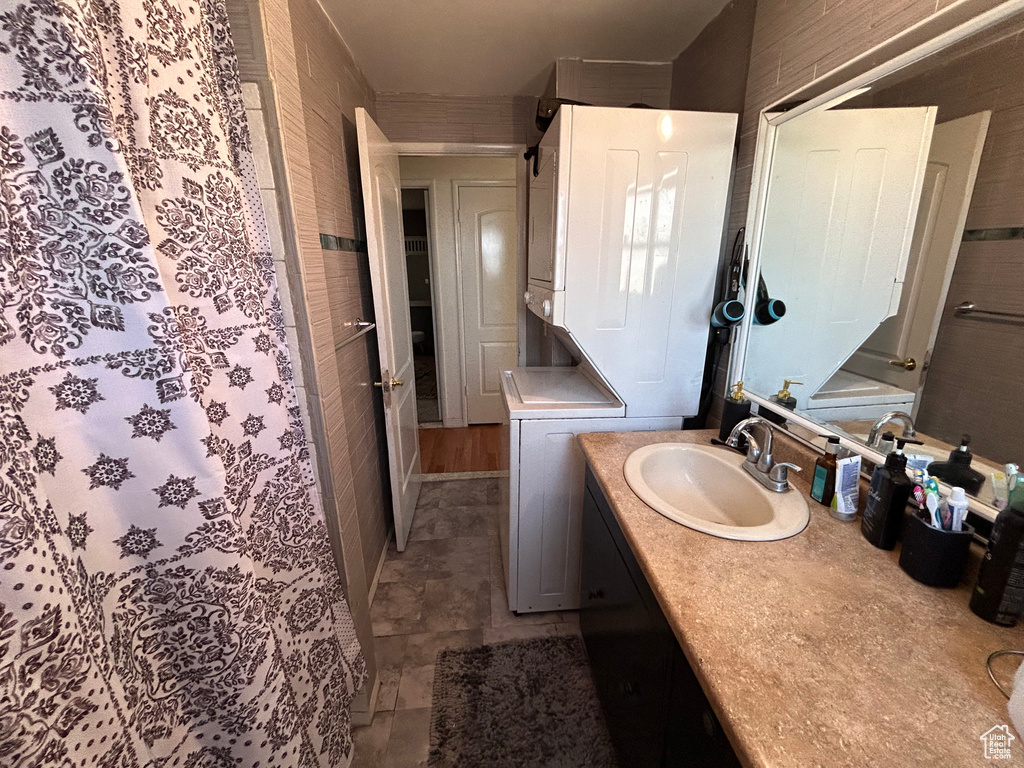 Bathroom with tile floors and vanity with extensive cabinet space