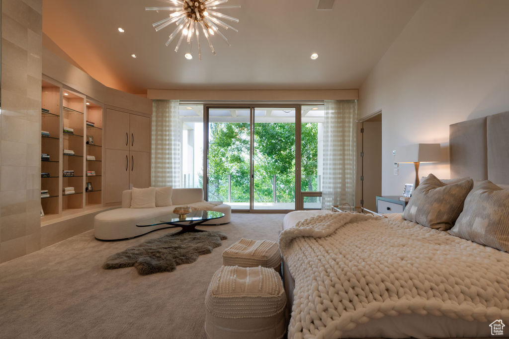 Carpeted bedroom with vaulted ceiling