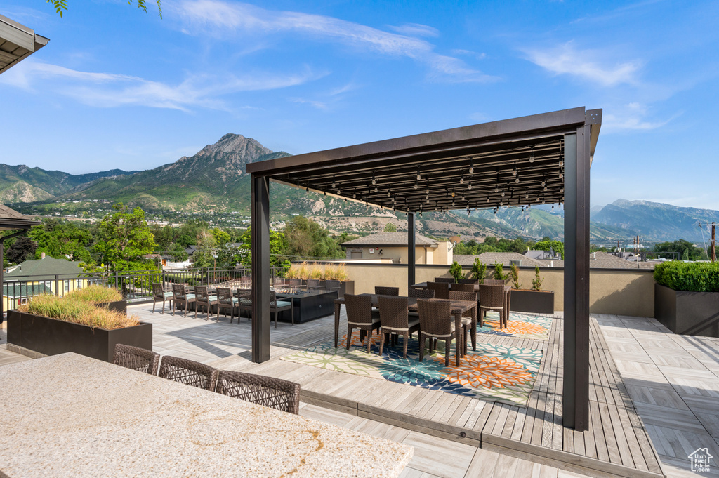 View of patio / terrace with a mountain view and a pergola