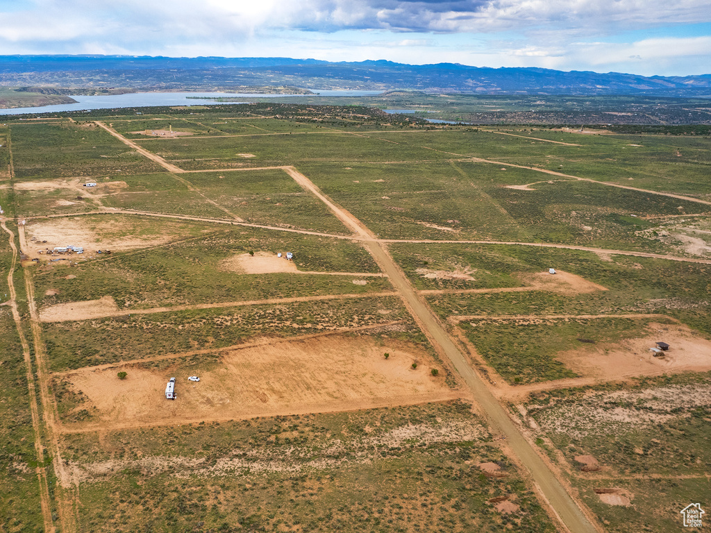 Drone / aerial view with a mountain view and a rural view