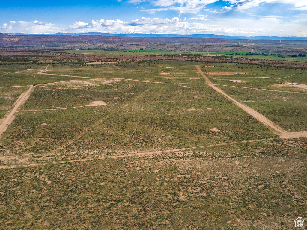 Drone / aerial view featuring a mountain view and a rural view