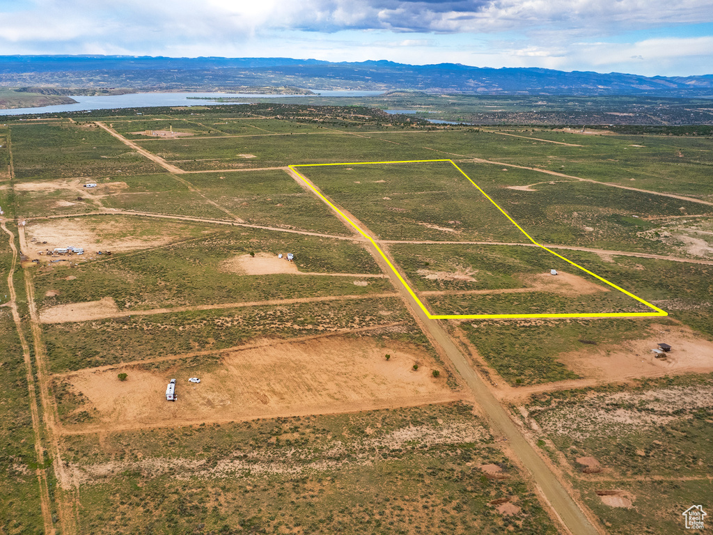 Drone / aerial view with a mountain view and a rural view