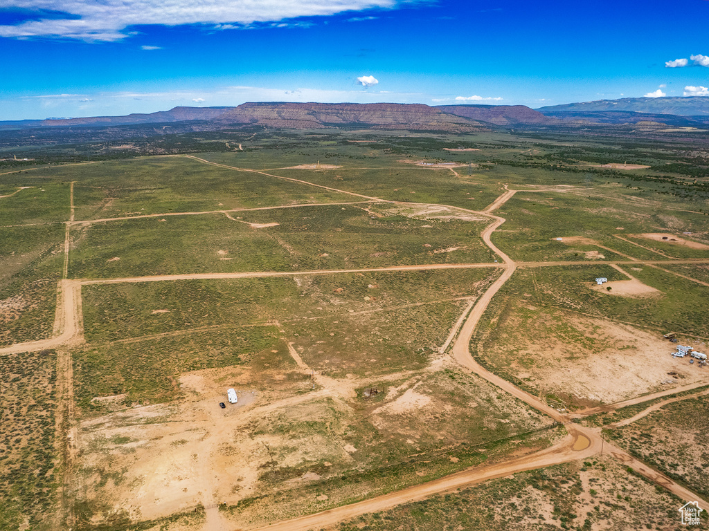 Drone / aerial view with a mountain view and a rural view