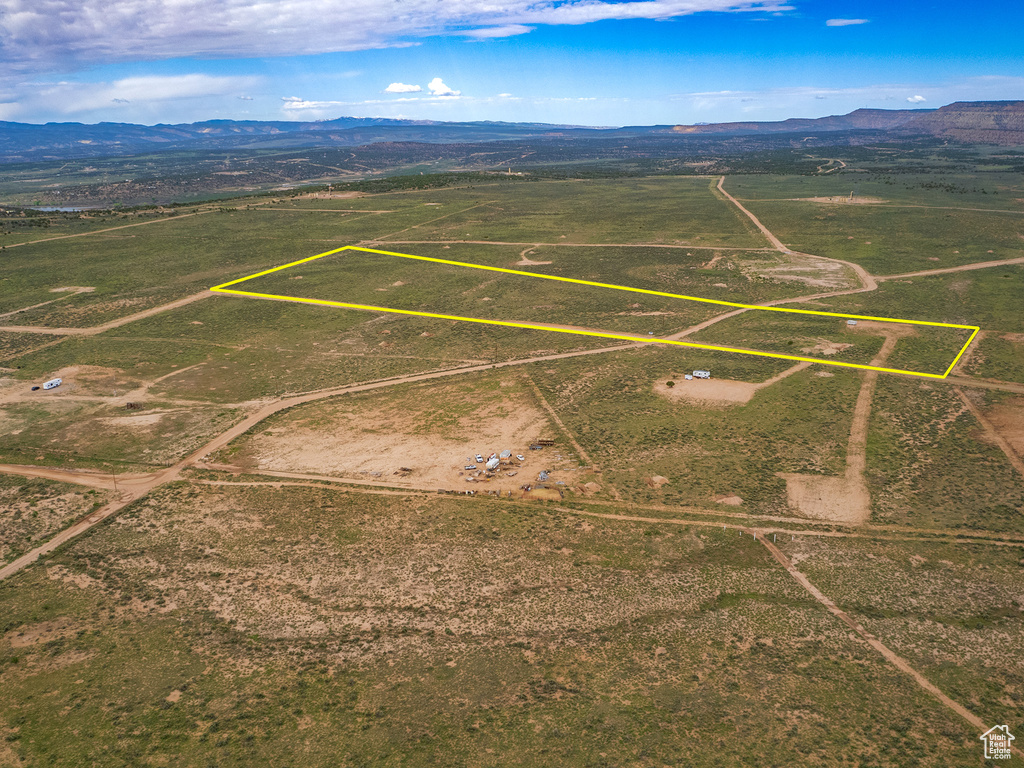 Drone / aerial view featuring a mountain view and a rural view