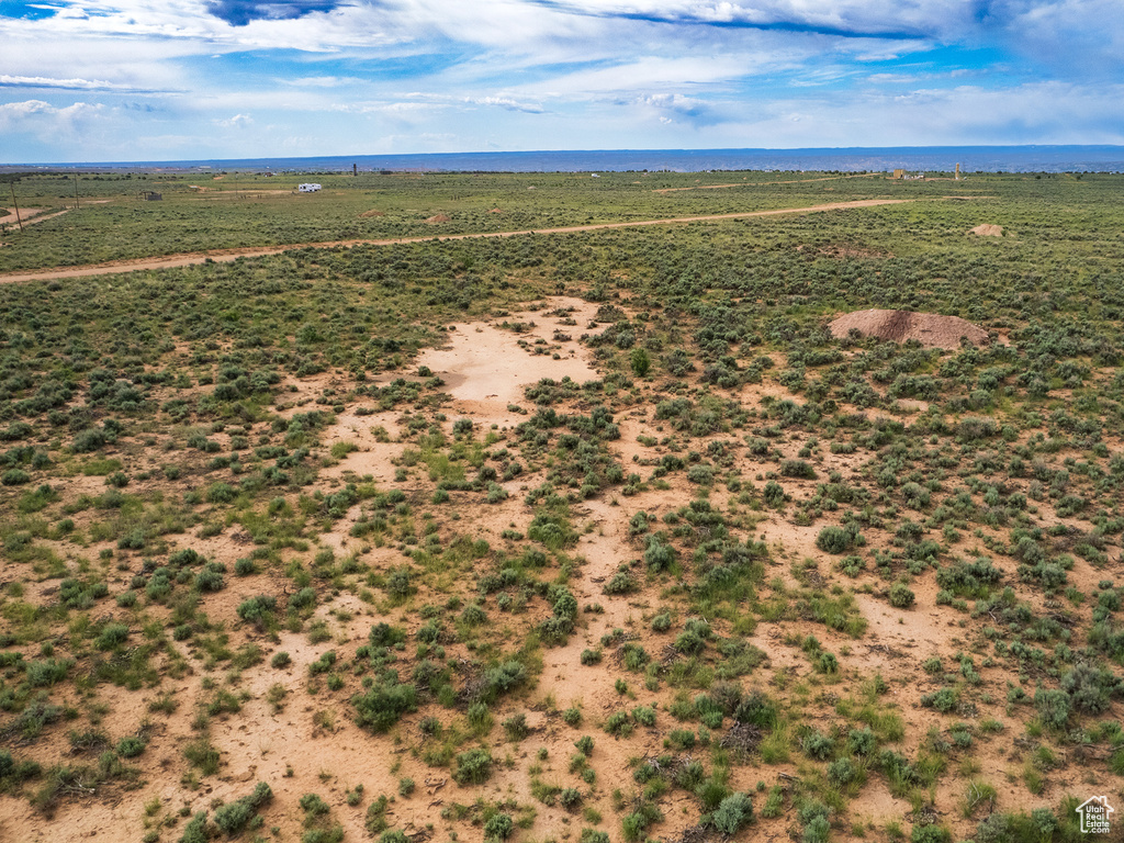 Birds eye view of property featuring a rural view