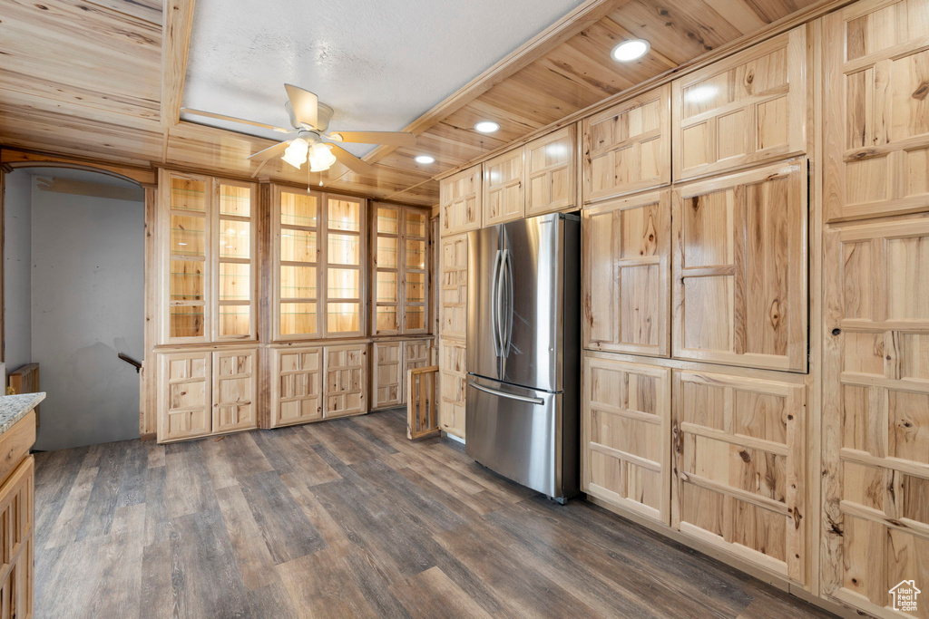 Kitchen featuring stainless steel refrigerator, wooden ceiling, ceiling fan, and dark hardwood / wood-style flooring