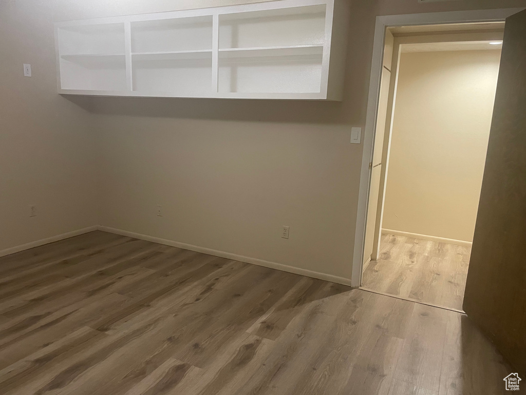 Empty room with light wood-type flooring