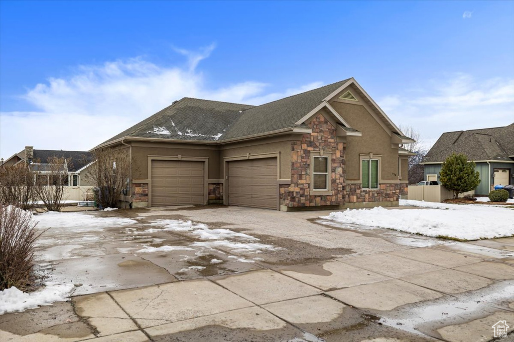 View of front of home with a garage