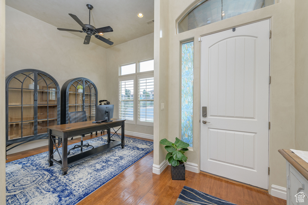 Entryway featuring light hardwood / wood-style flooring and ceiling fan