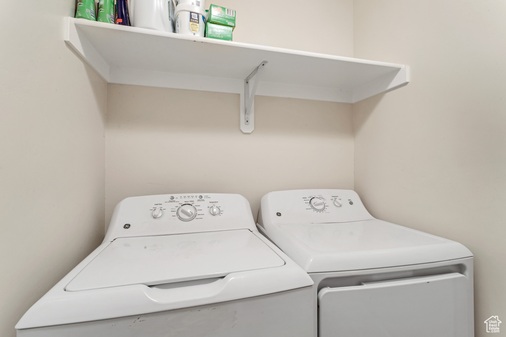Laundry room with washing machine and dryer