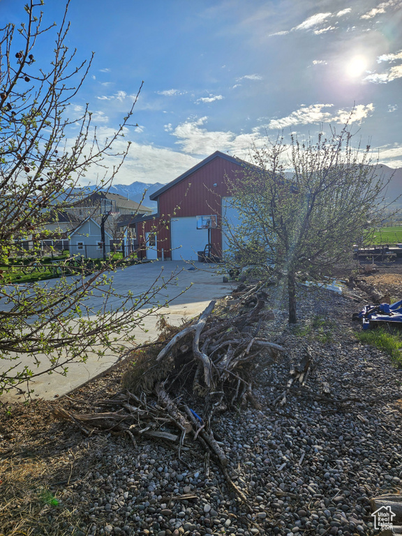 Back of property featuring a mountain view