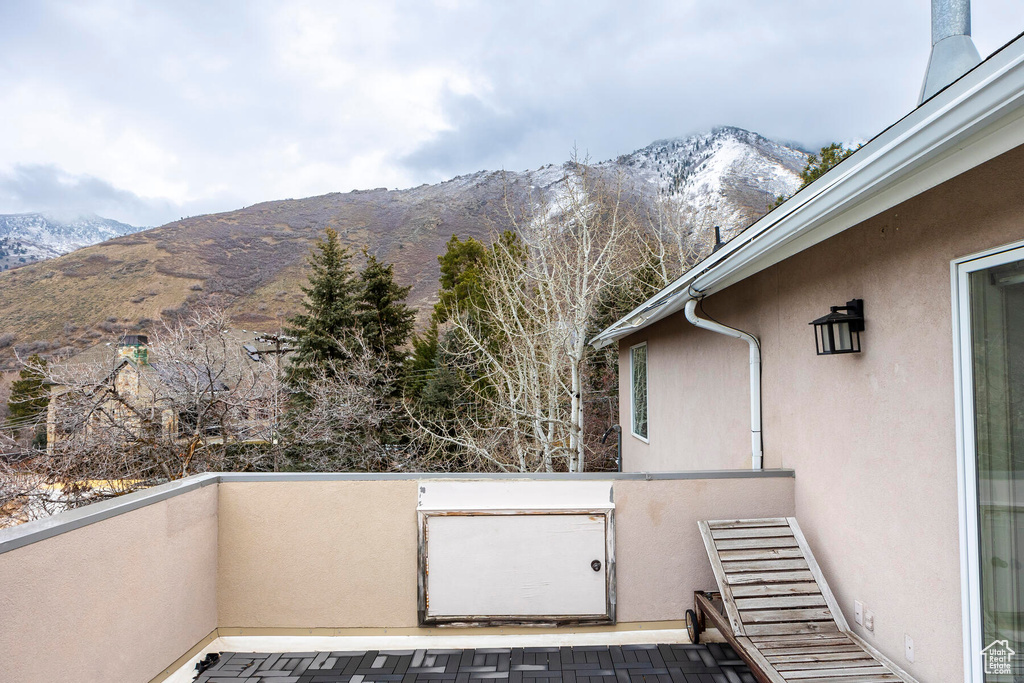 View of patio / terrace featuring a balcony and a mountain view