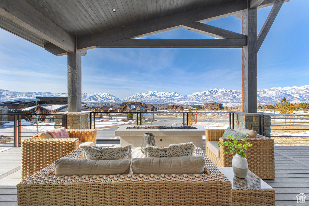 View of patio / terrace featuring a mountain view and an outdoor hangout area