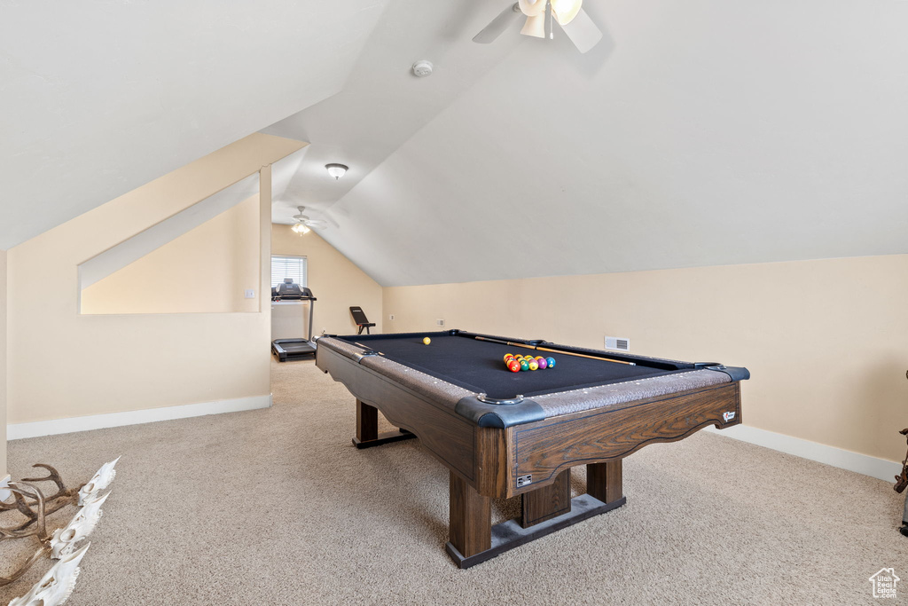 Playroom featuring pool table, ceiling fan, light colored carpet, and lofted ceiling