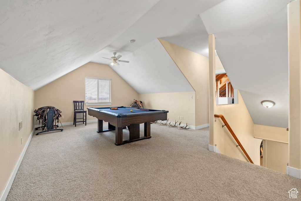 Rec room featuring light carpet, pool table, ceiling fan, and lofted ceiling