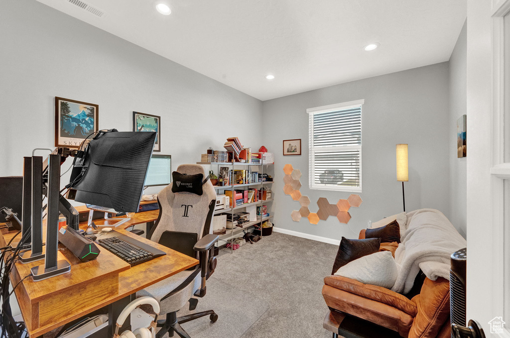 Home office featuring carpet floors