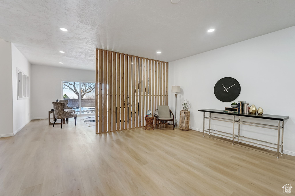 Misc room with light hardwood / wood-style flooring