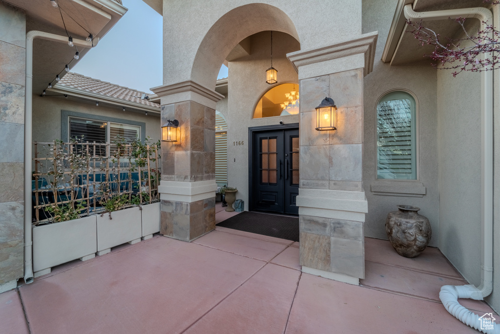 Entrance to property with a patio area