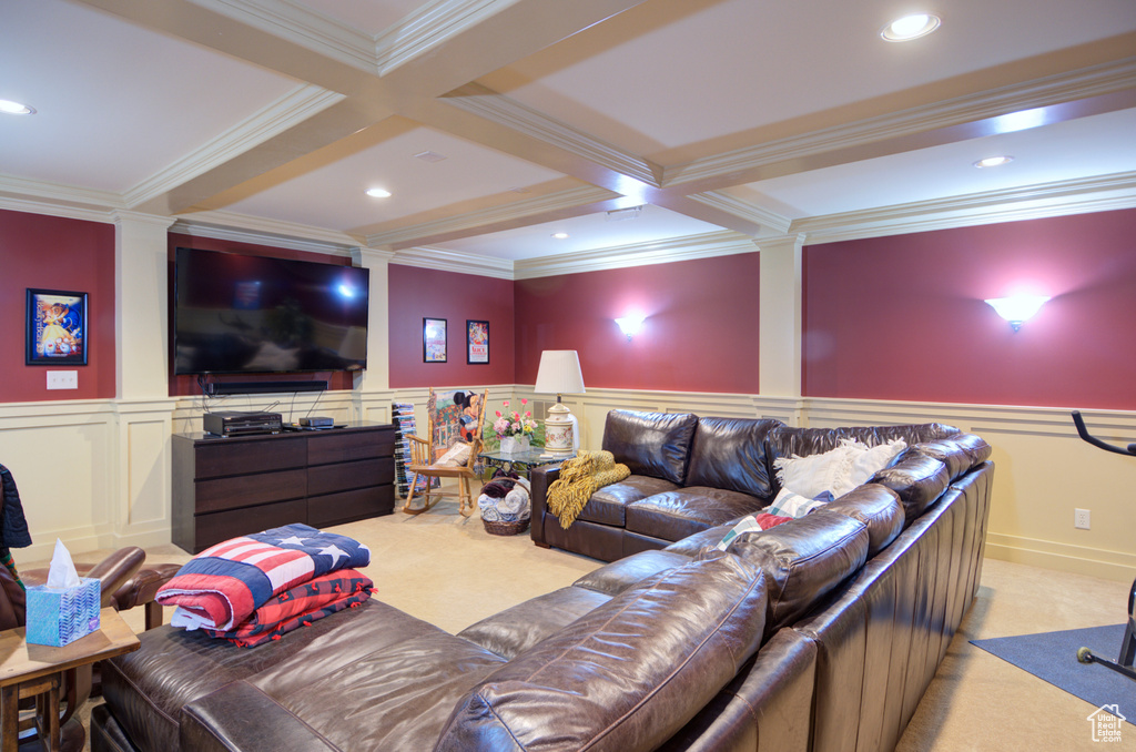 Living room featuring coffered ceiling, light colored carpet, ornamental molding, and beam ceiling