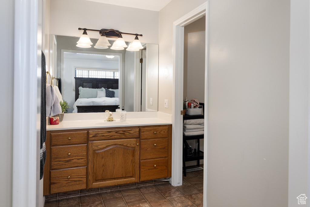 Bathroom with vanity and tile flooring