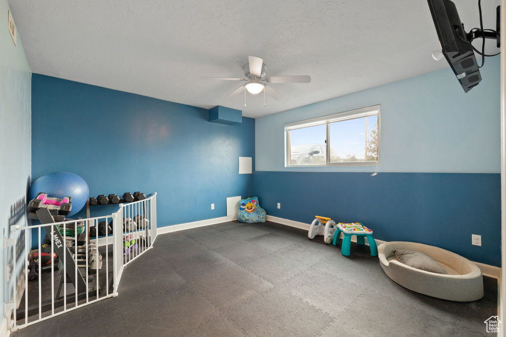 Playroom with ceiling fan