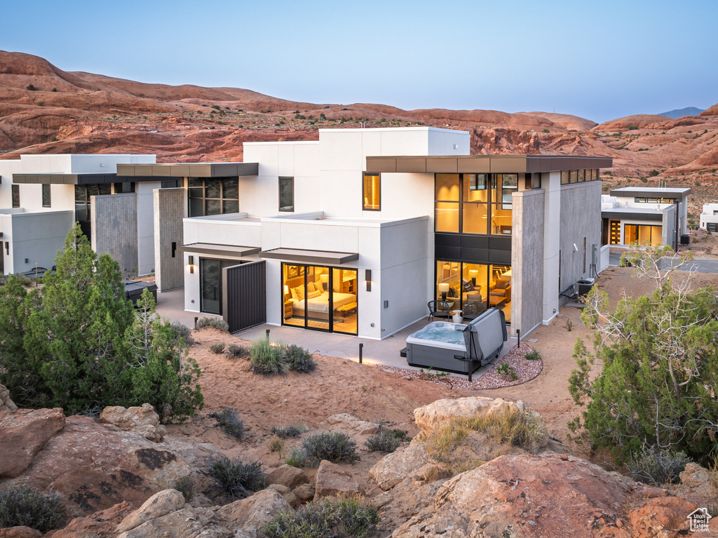 Back of property featuring a mountain view