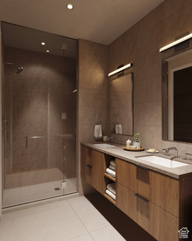 Bathroom with walk in shower, tasteful backsplash, tile walls, dual vanity, and tile flooring